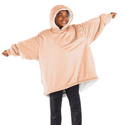 A youth wearable blanket on a child