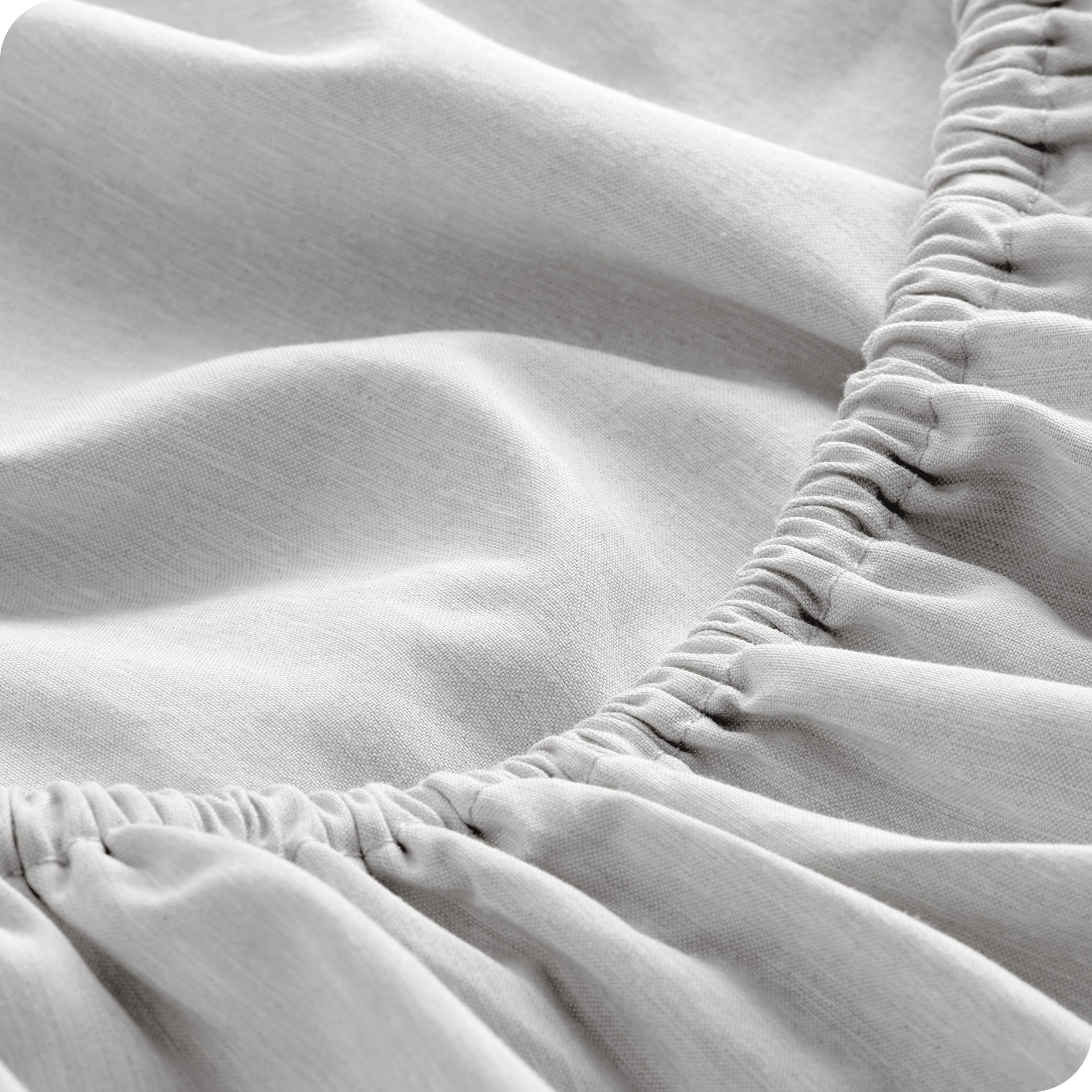 Close-up of fitted sheet with elastic edge