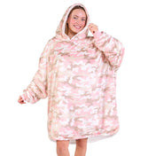 An adult with a sherpa wearable blanket on