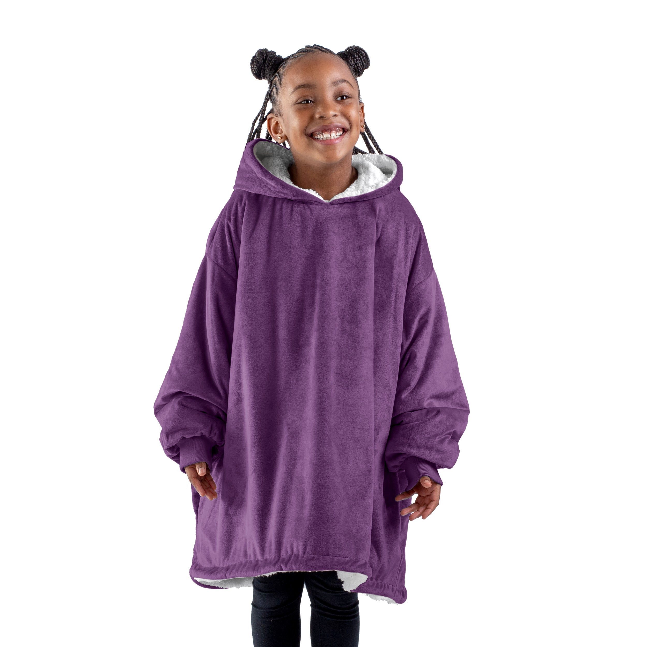 A child with a sherpa wearable blanket on