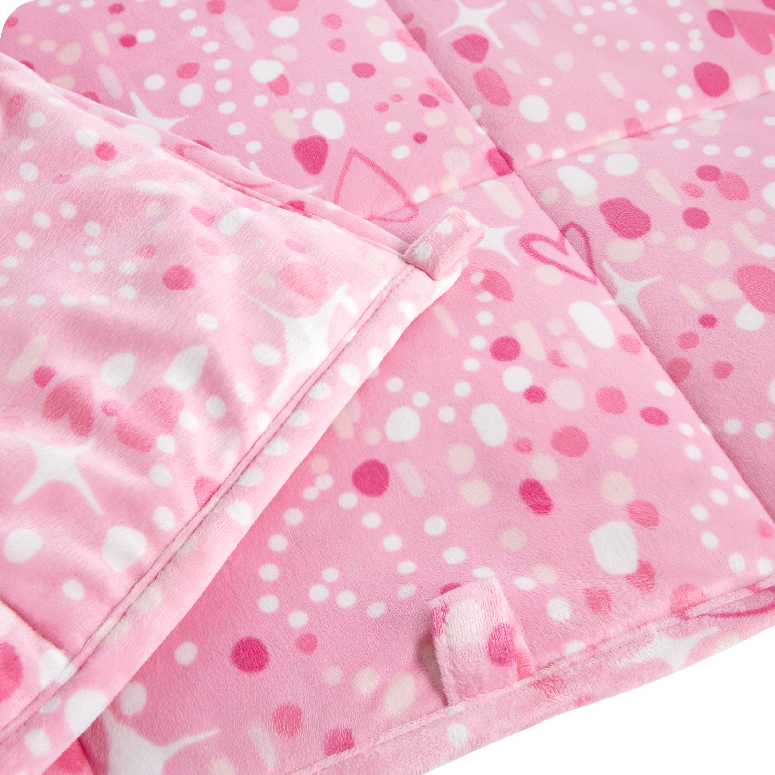 Close-up image of a weighted blanket, featuring detailed stitching and the neatly finished edge of the blanket.