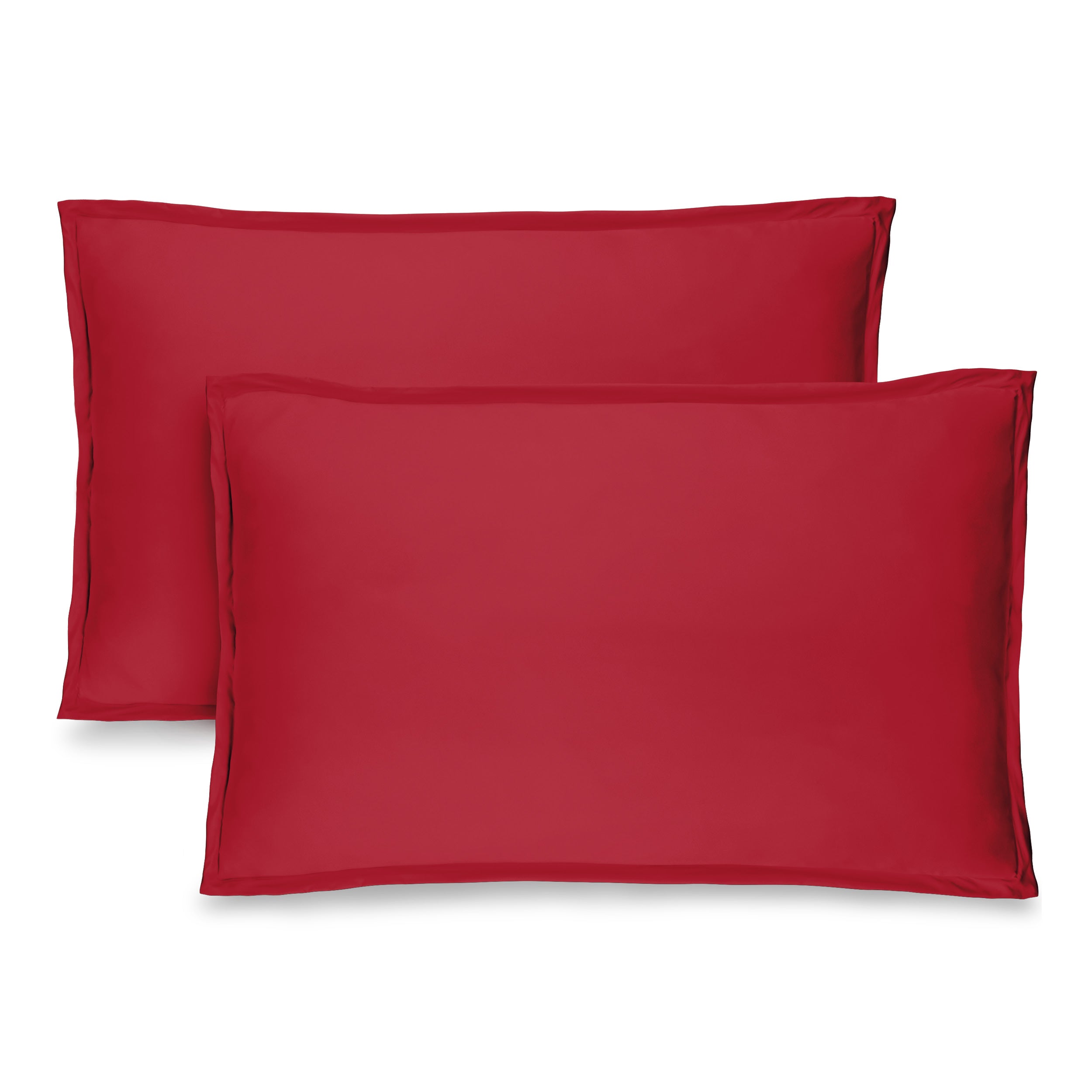 Two microfiber pillow shams on a white background