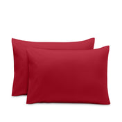 2 pillowcases on pillows