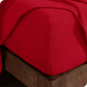 Fitted sheet on a wooden bed frame