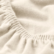 Close up of a flannel fitted sheet.