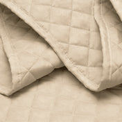 Close in view showing texture of coverlet set fabric