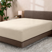 A single fleece fitted sheet on a bed