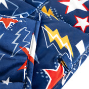 Close-up image of a weighted blanket, featuring detailed stitching and the neatly finished edge of the blanket.