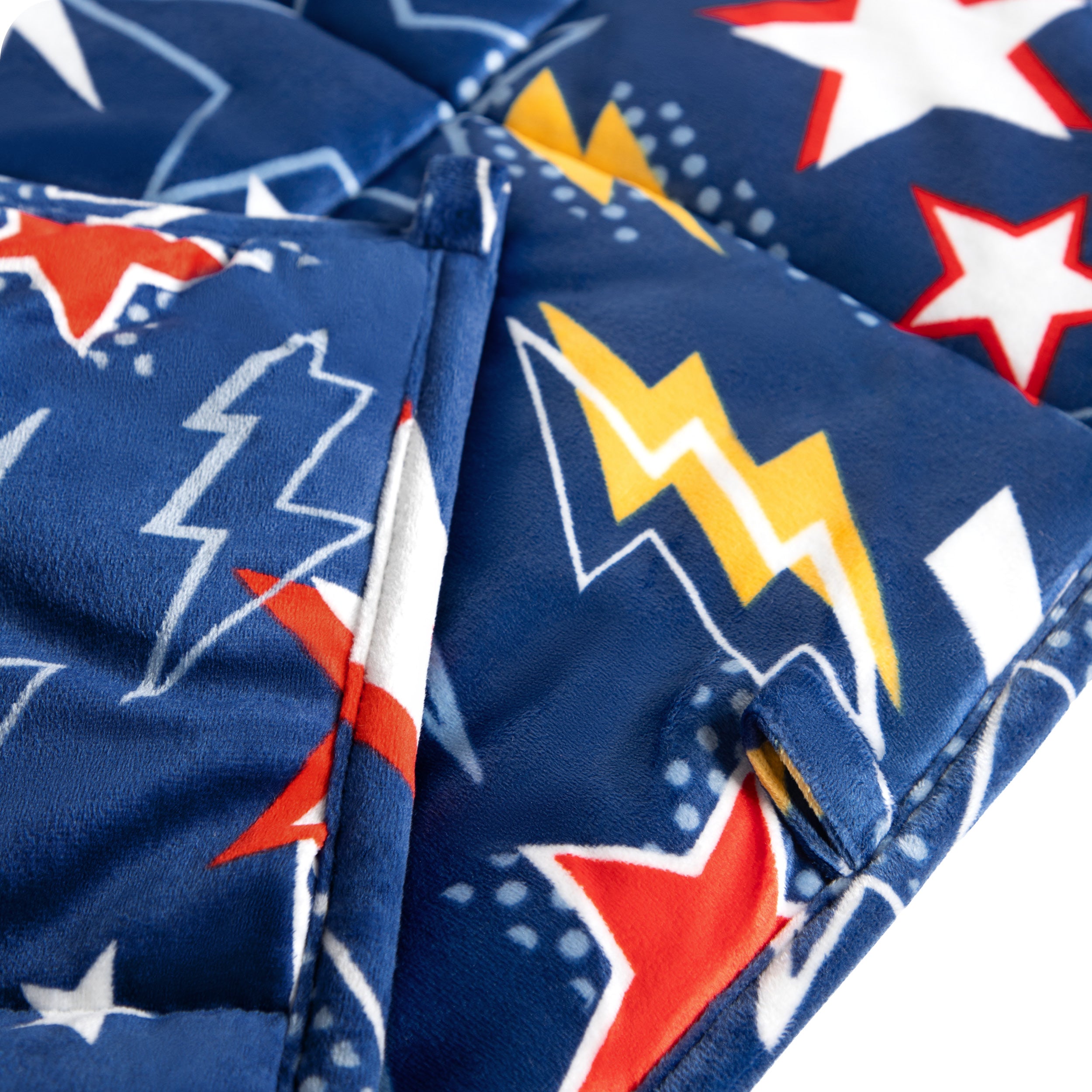 Close-up image of a weighted blanket, featuring detailed stitching and the neatly finished edge of the blanket.