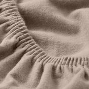 Close up of a flannel fitted sheet.