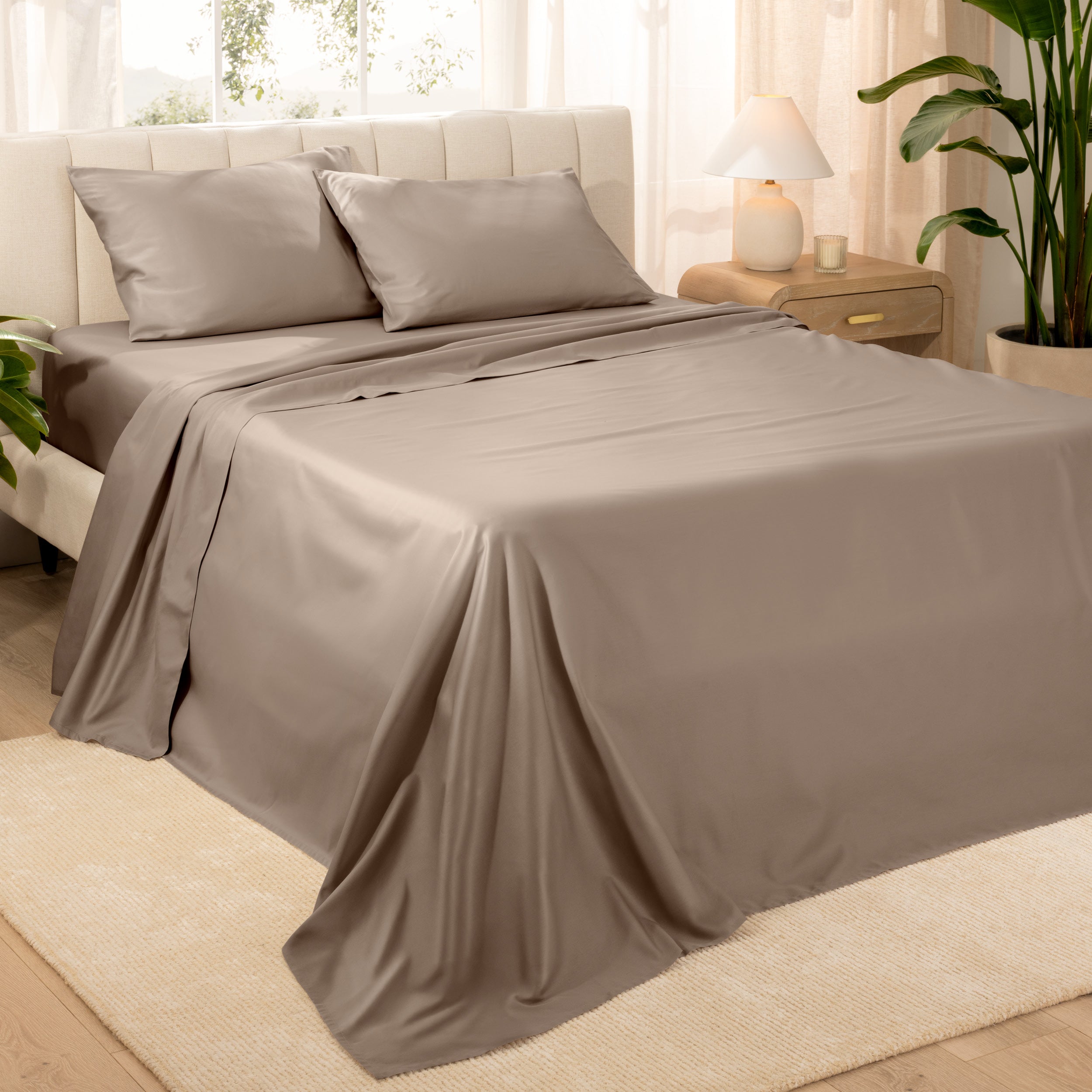Modern bedroom with sateen sheets on the bed