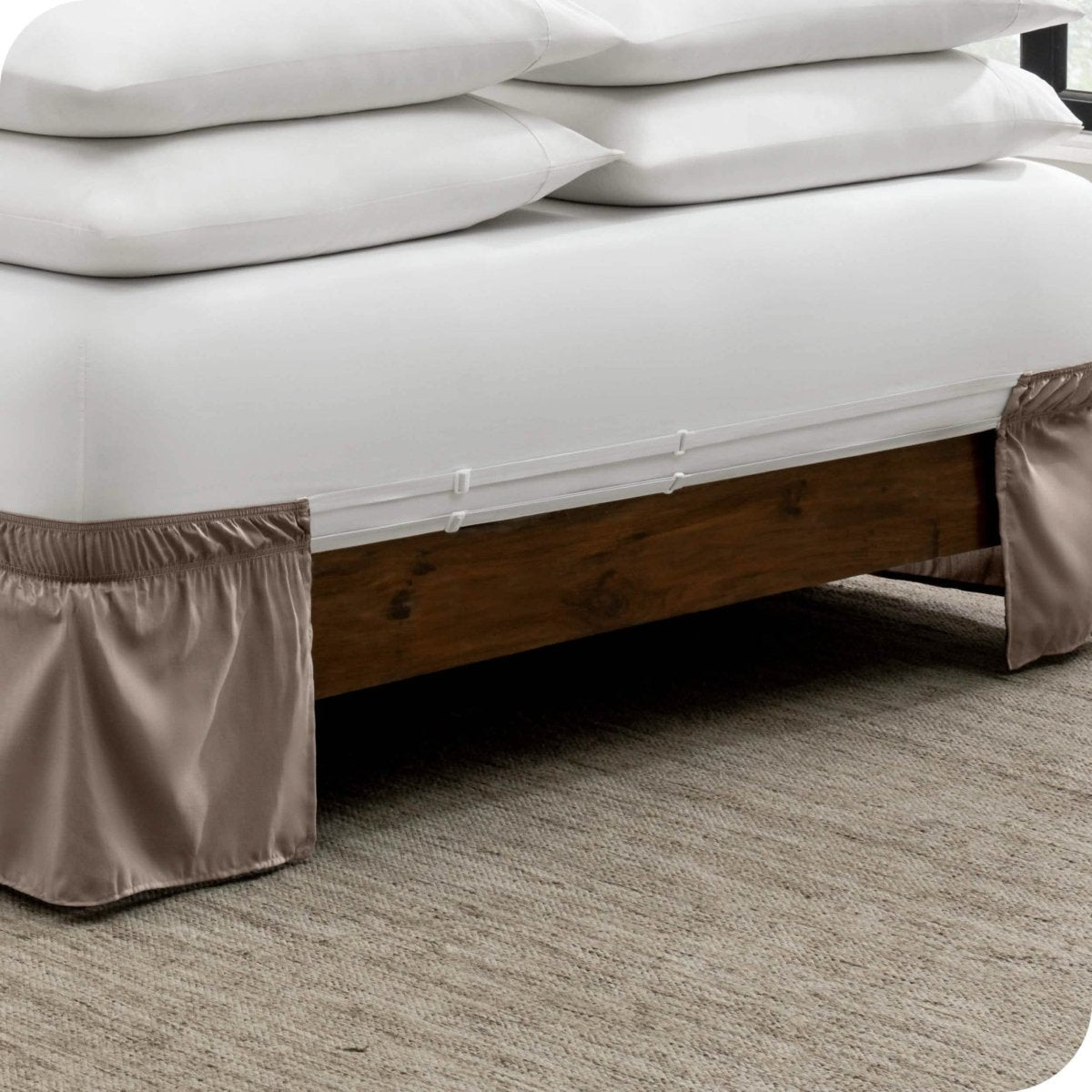 The adjustable elastic bands on a bed skirt