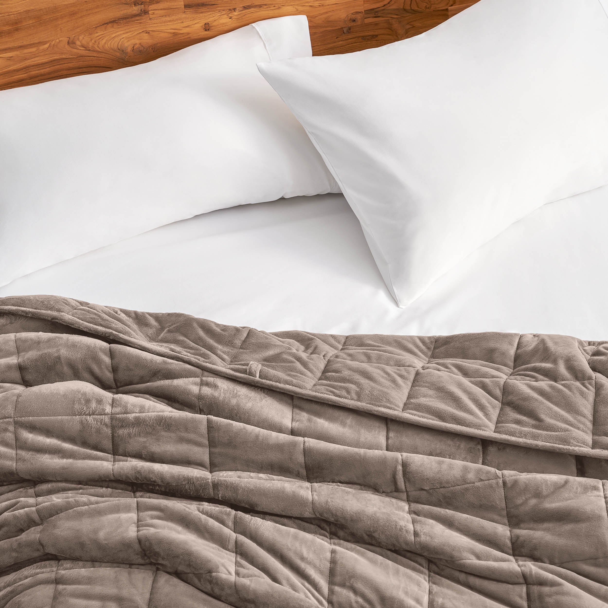 Close-up of a minky weighted blanket on a bed