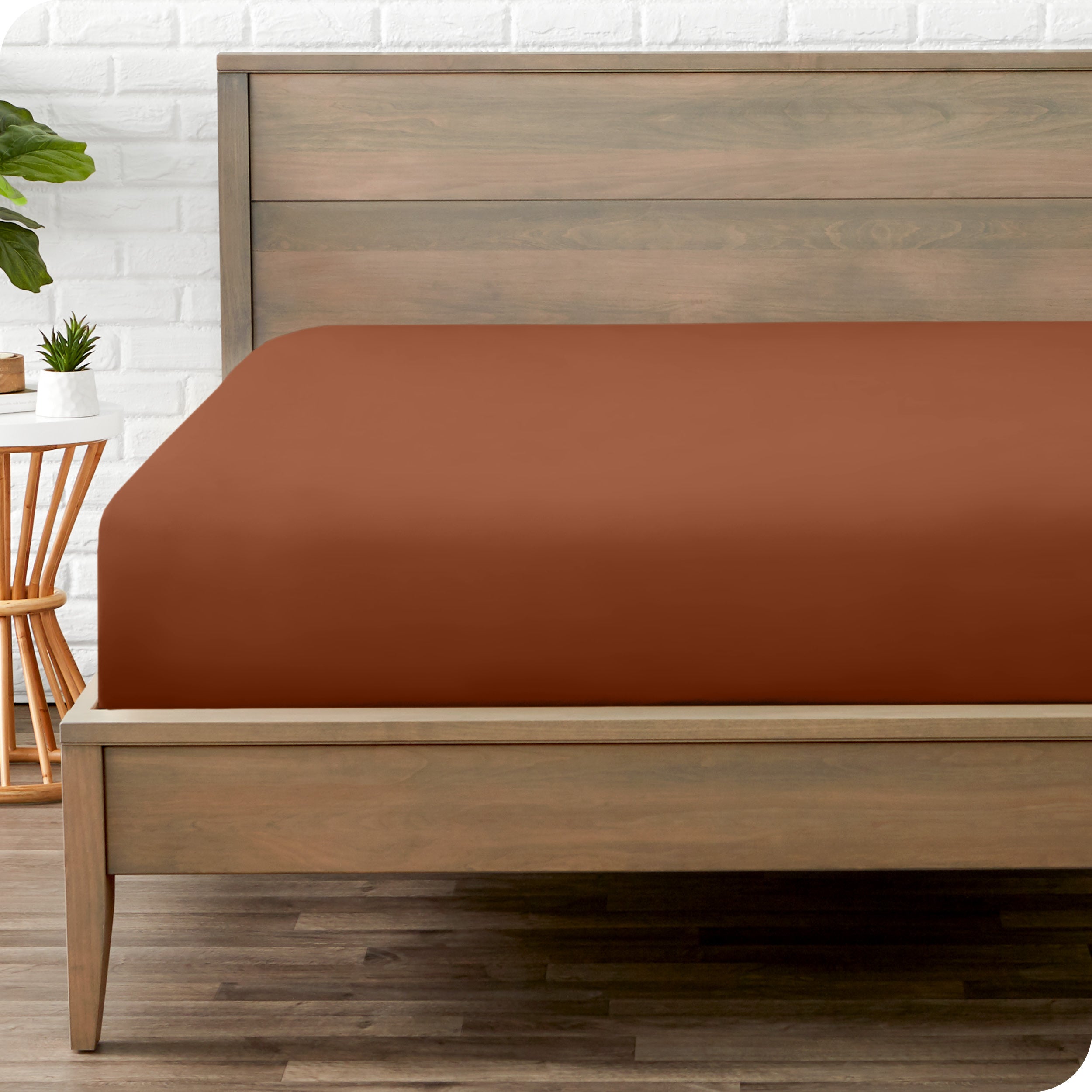 A mattress with just a fitted sheet on it