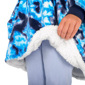Child wearing a Bare Home wearable blanket