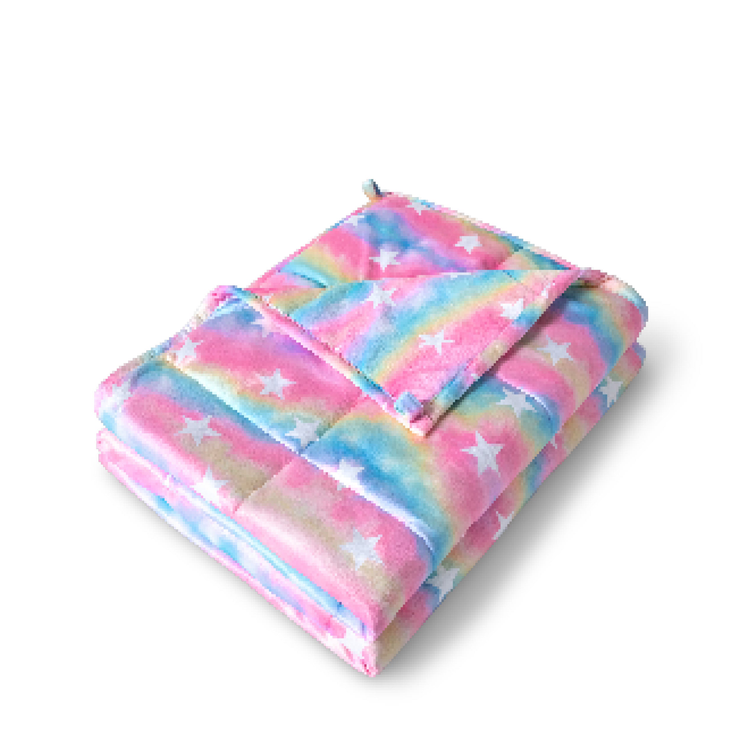 A minky weighted blanket folded neatly on a white background.