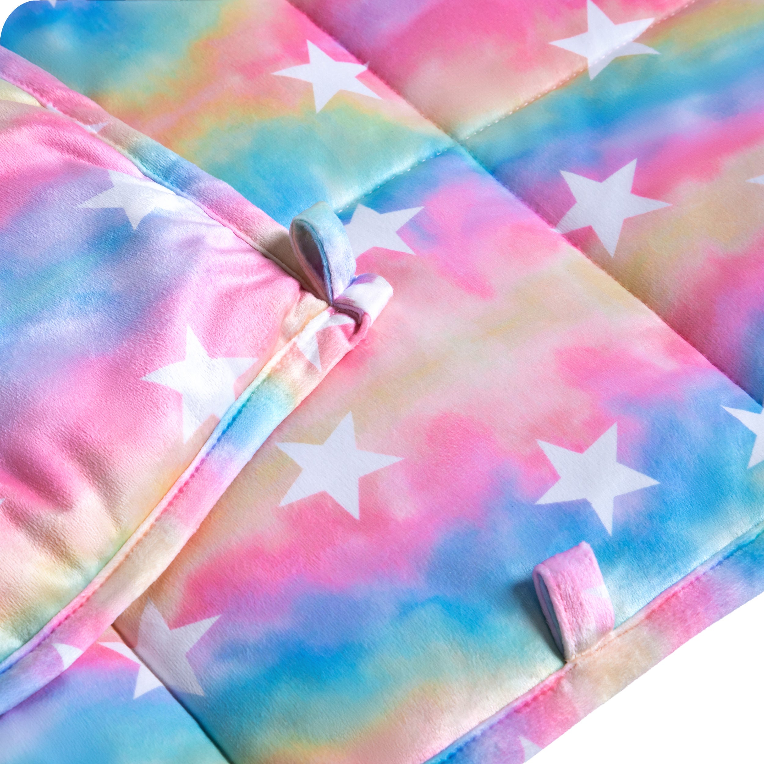 Close-up image of a weighted blanket, featuring detailed stitching and the neatly finished edge of the blanket.