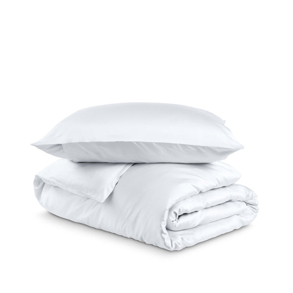 Bedding set with duvet cover and pillow shams on a white background