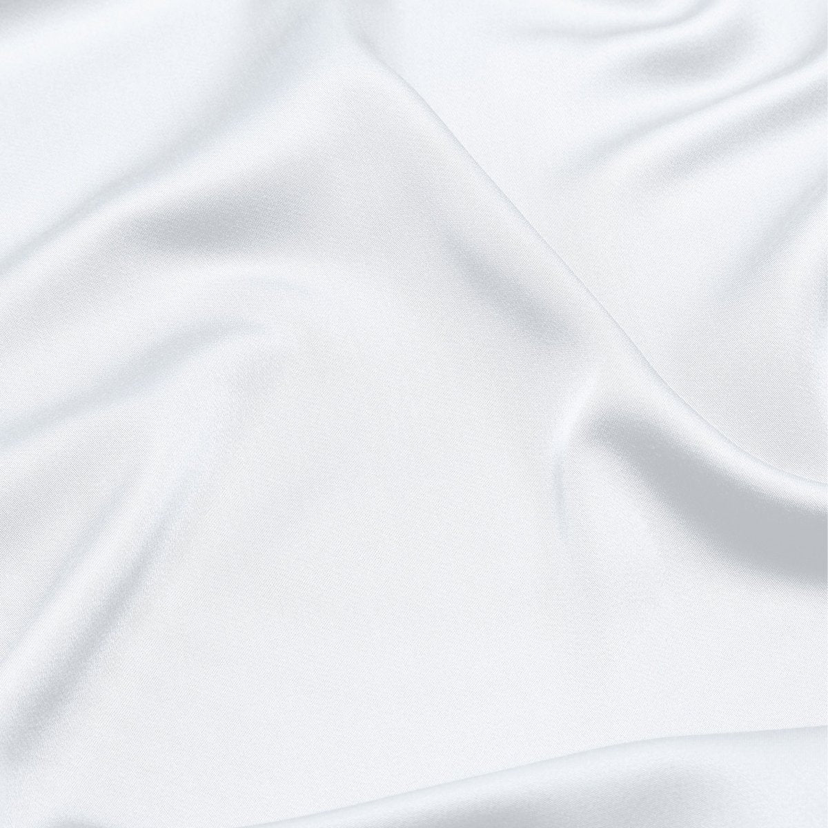 Close-up of white fabric with folds