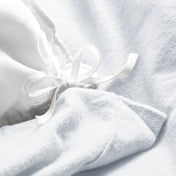 Close-up of the ties on a flannel duvet cover