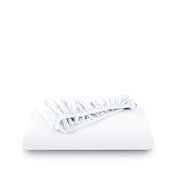 White fitted sheet on white background