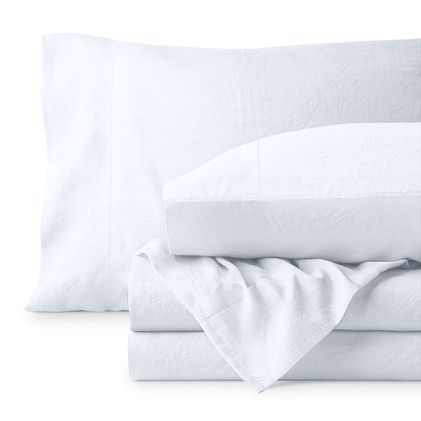 Washed microfiber sheet set folded and stacked on a white background