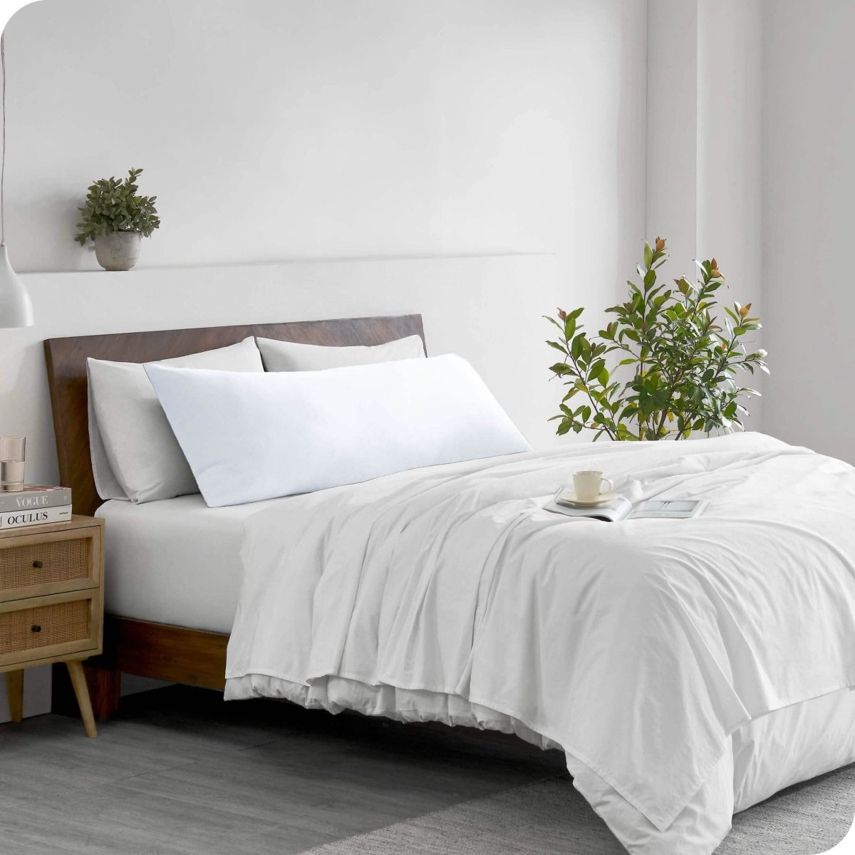 A body pillowcase on a pillow on a bed in a modern bedroom