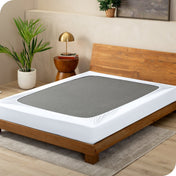 White box spring cover on a box spring