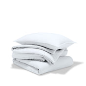 A comforter set folded and stacked