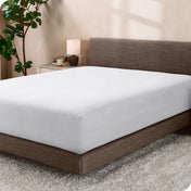 A single fleece fitted sheet on a bed