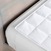 Close-up of a weighted blanket on a bed