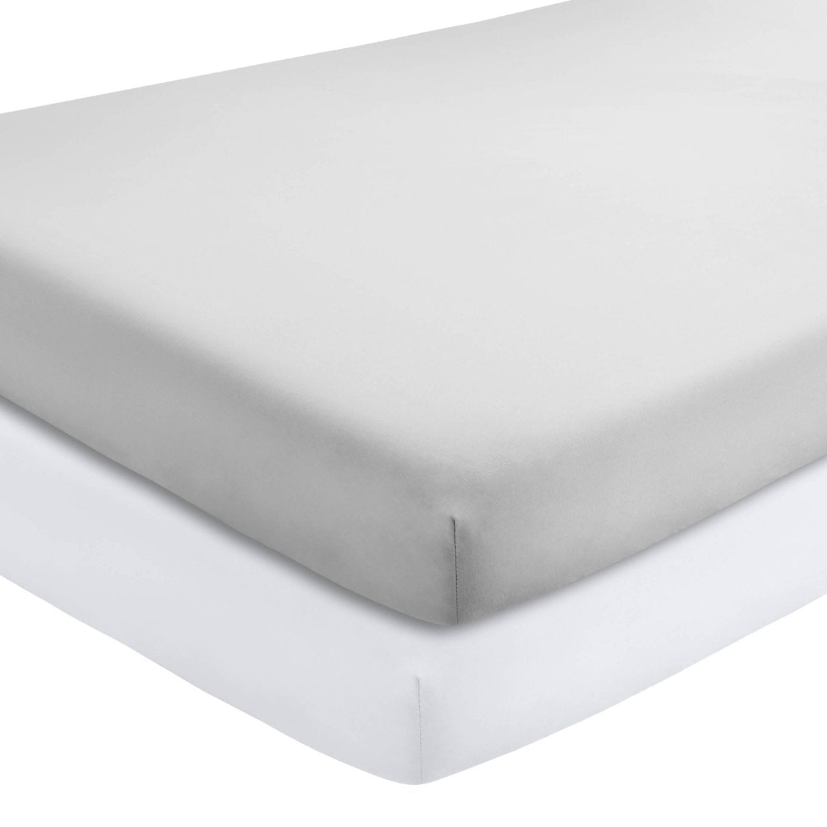 Two crib mattresses with a fitted sheets on them