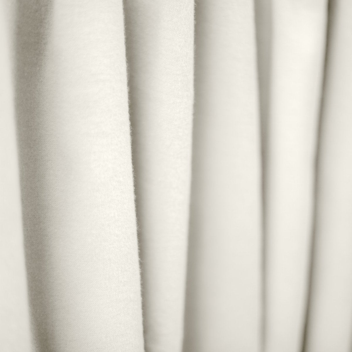 Close up image of a grey receiving blanket