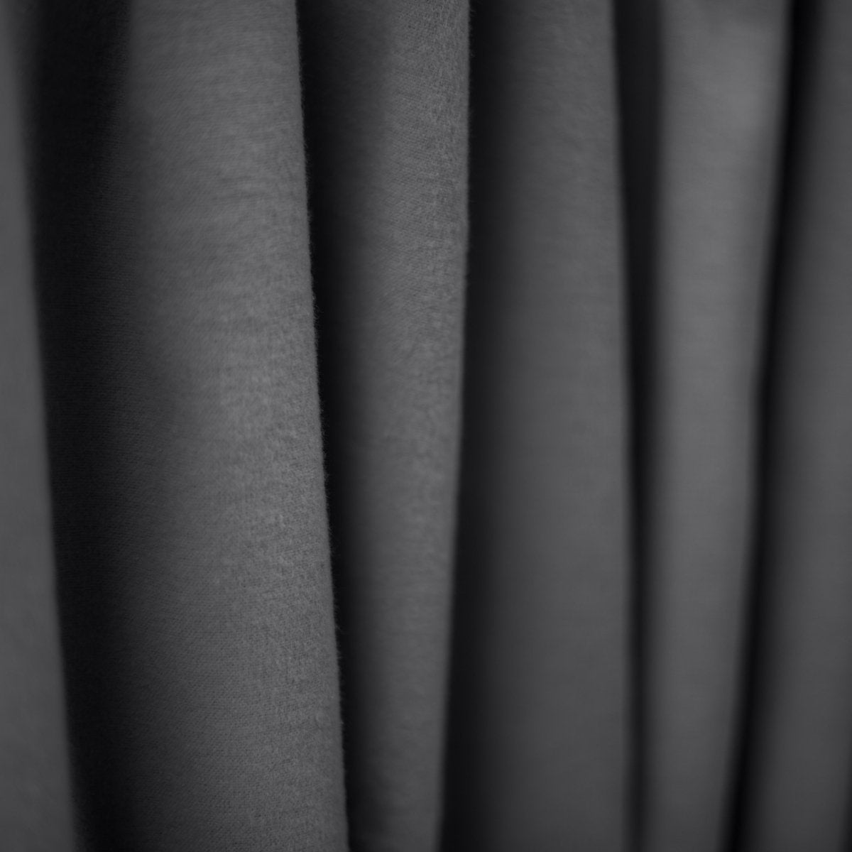 Close up image of a grey receiving blanket
