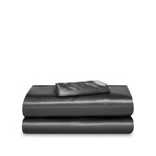 Satin sheet set folded and stacked neatly