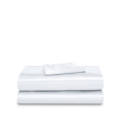 Satin sheet set folded and stacked neatly