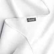 Up close image flannel receiving blanket showing tag