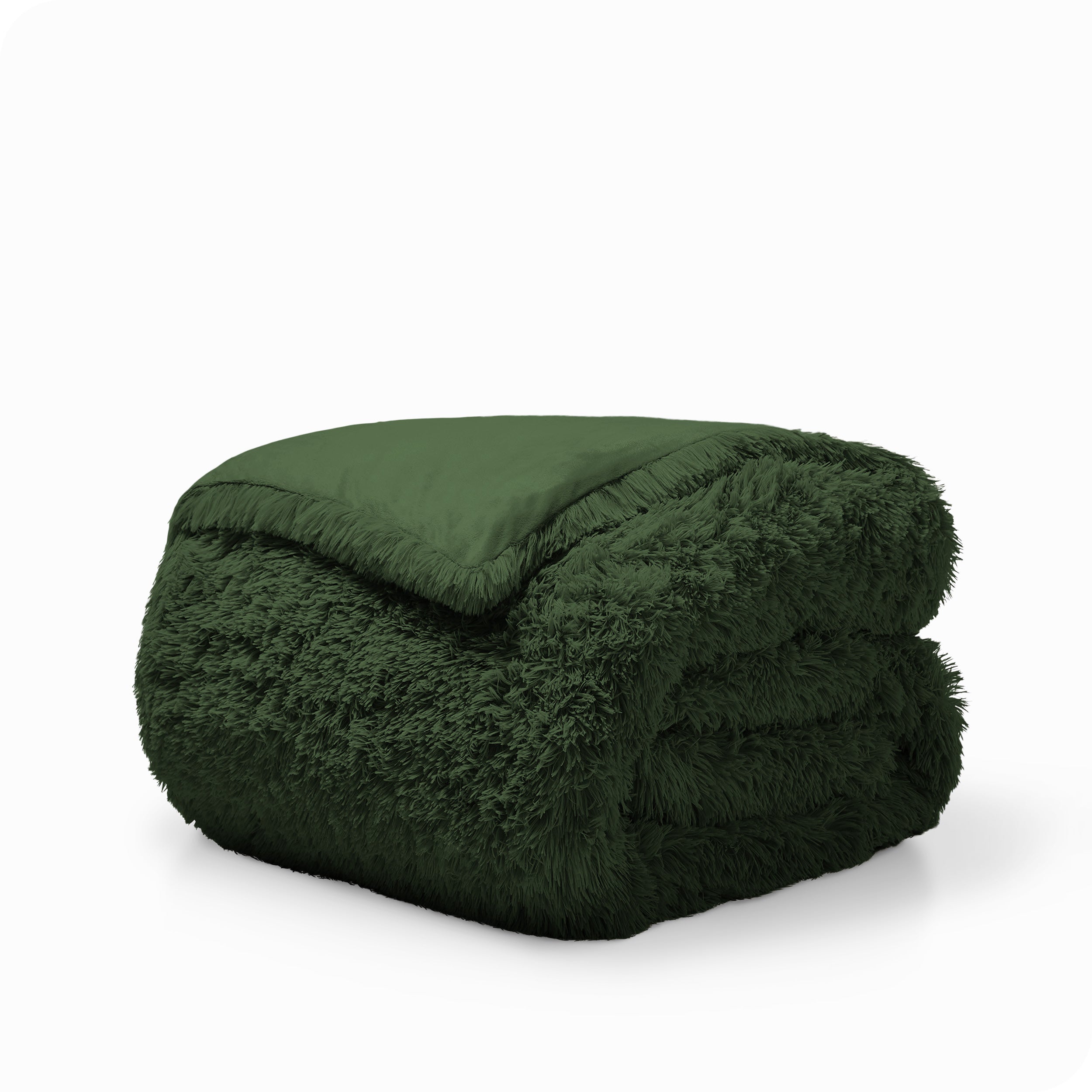 A forest green shaggy duvet cover folded neatly