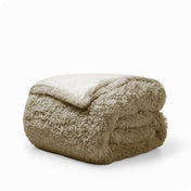 A sand shaggy duvet cover folded neatly