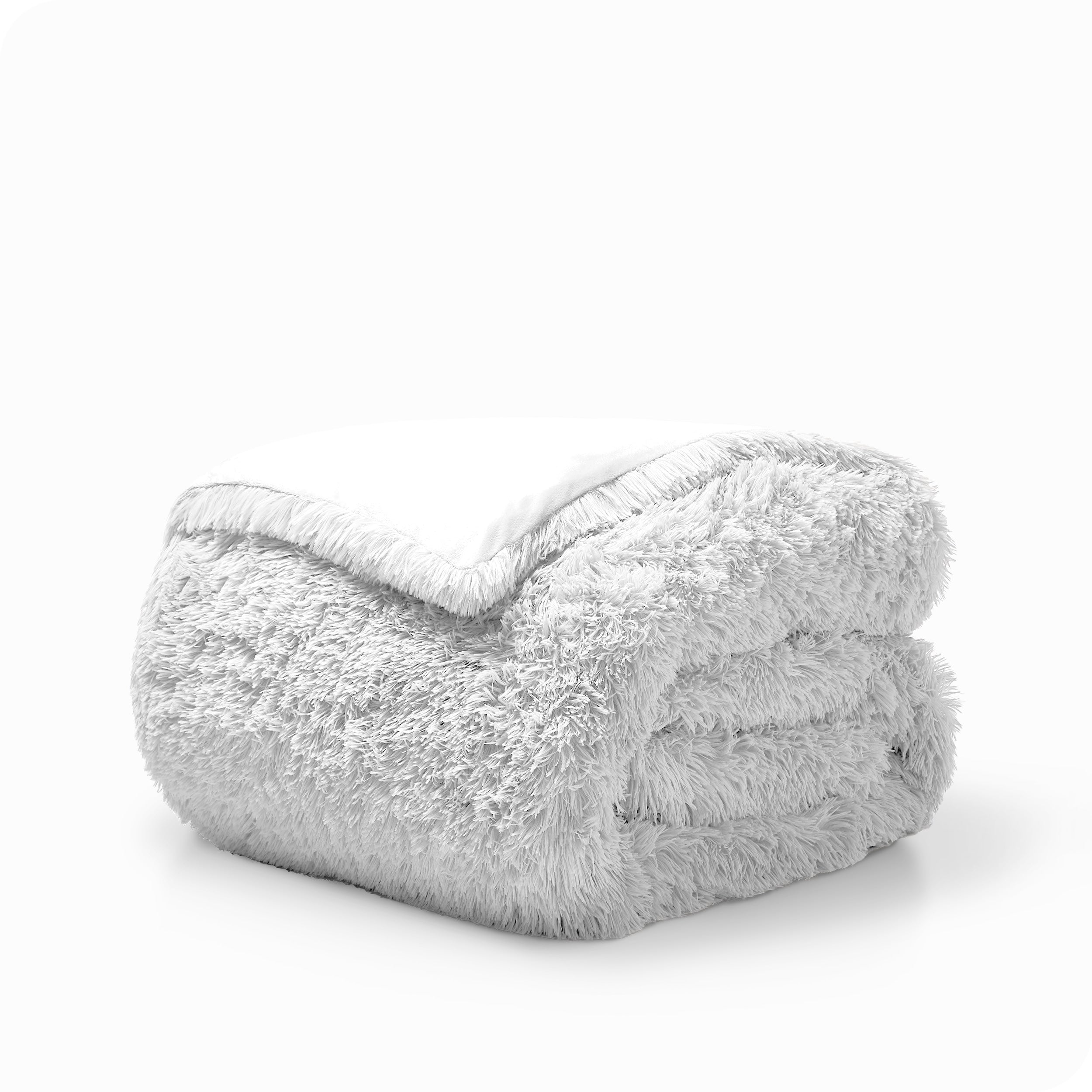 A white shaggy duvet cover folded neatly