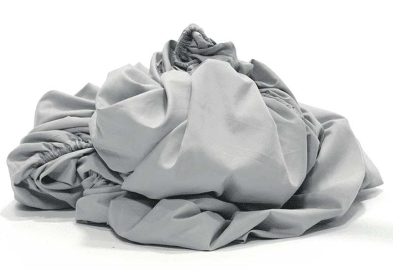 The Easiest Way to Fold a Fitted Sheet - Bare Home