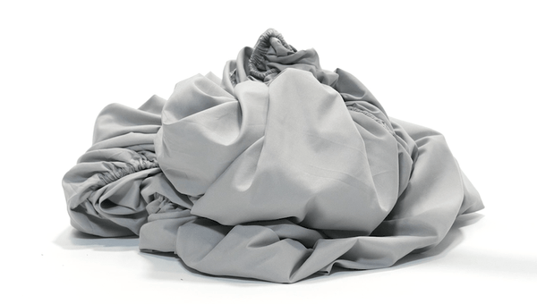 How to Fold a Fitted Sheet - Bare Home
