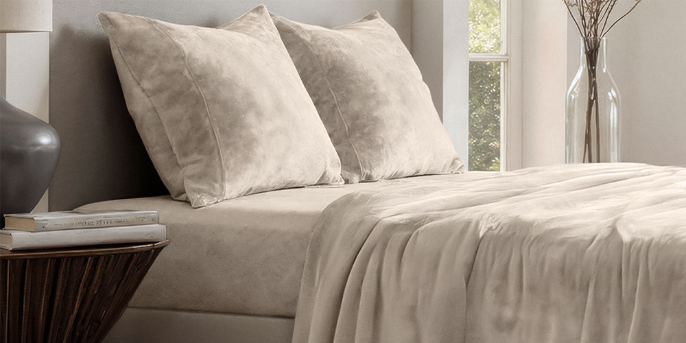 Bed styled with cream Microplush Fleece Sheet Set