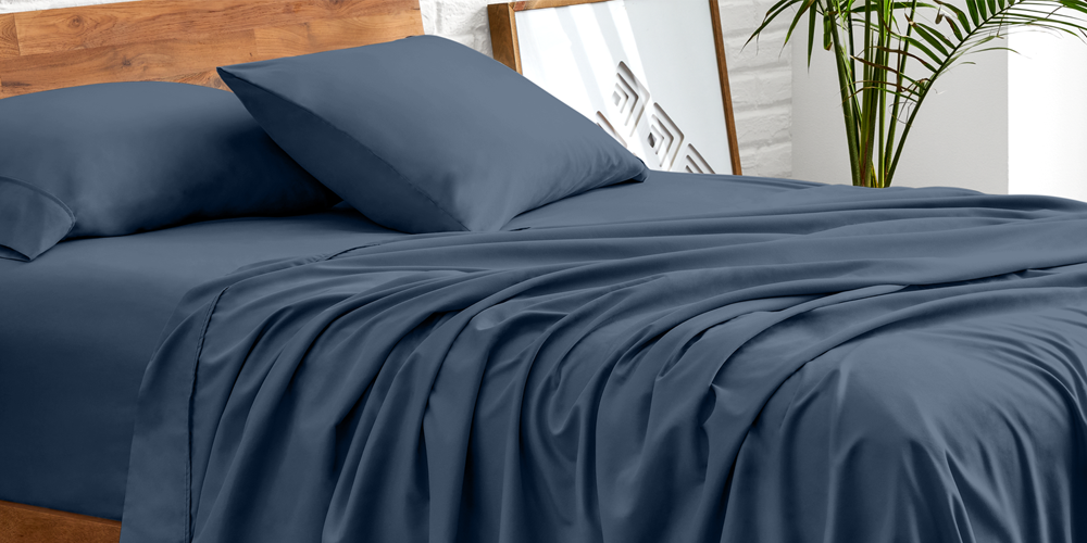 Bed with dark navy Ultra Soft Darks and Bolds Soft Sheet Set