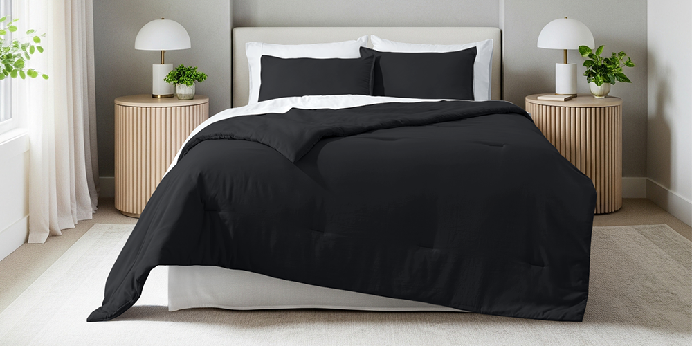Bed styled with black Ultra Soft Track Stitch Comforter Set, plant nearby