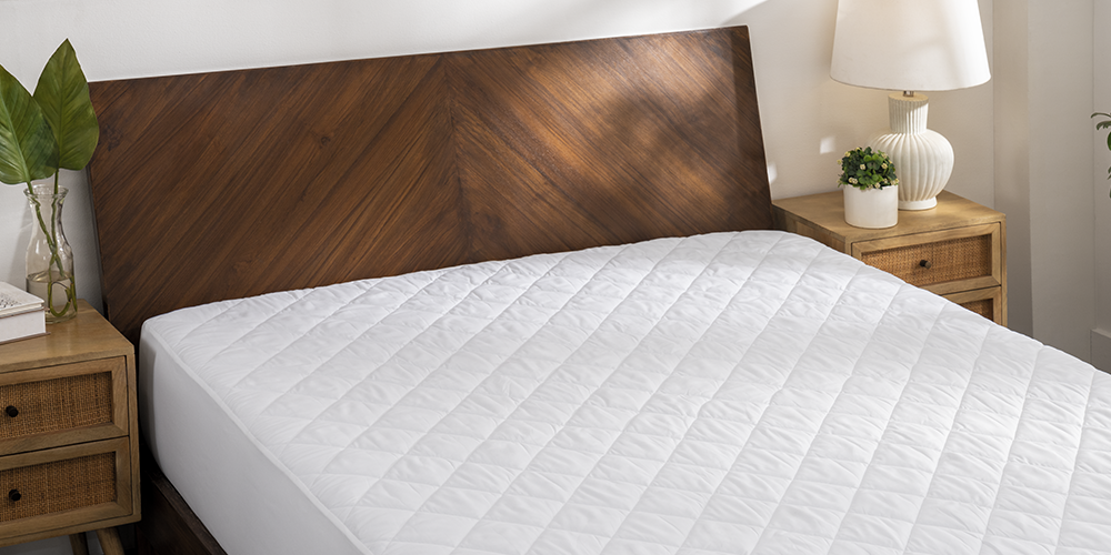 Bed with white Wrap Around Bed Skirt, closeup