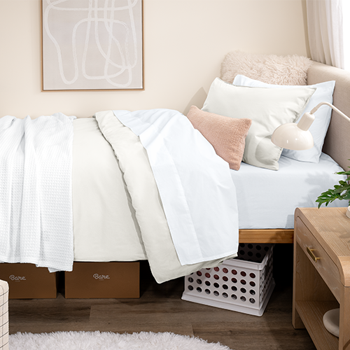 Bed styled with white Organic Cotton Percale Dorm Bundle