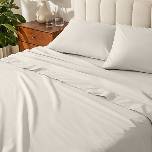 Stack of pillows with white Organic Cotton Percale Pillowcase Set