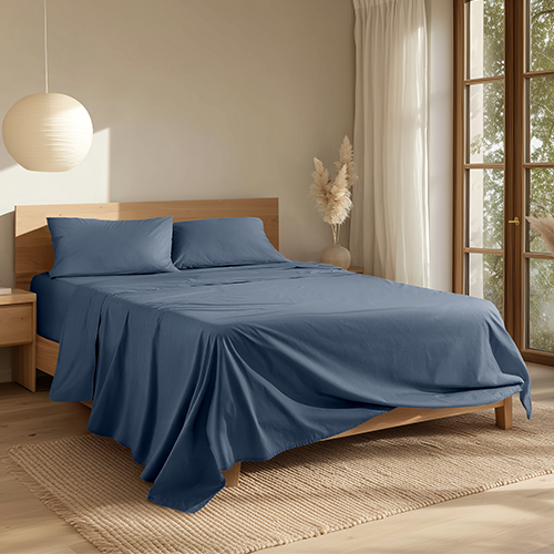 Bed with navy blue Organic Cotton Percale Sheet Set, closeup