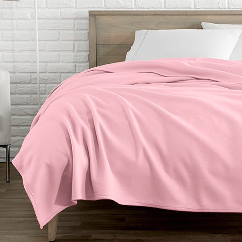 Bed with pink Polar Fleece Blanket
